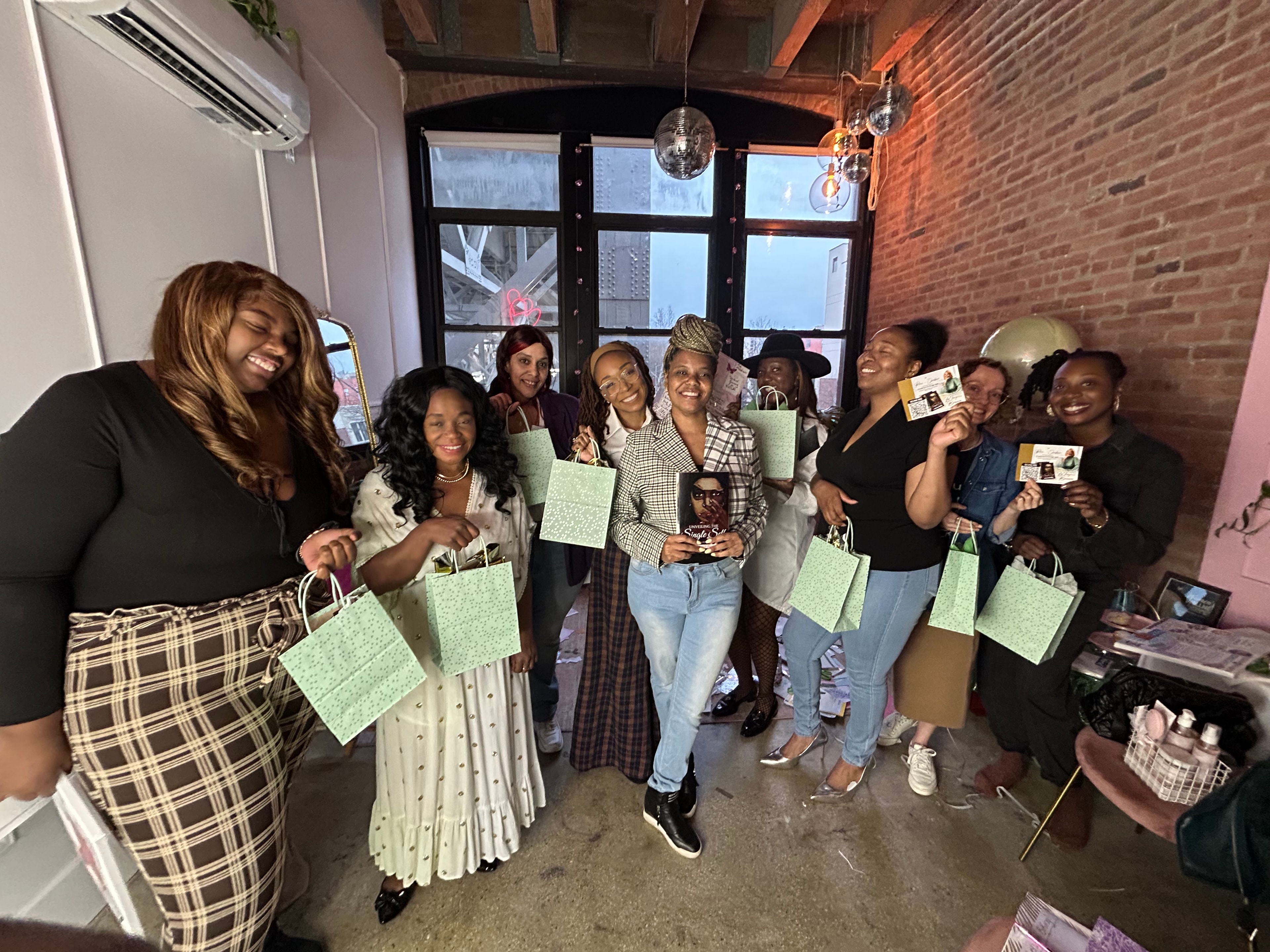 Women celebrating at a book launch event