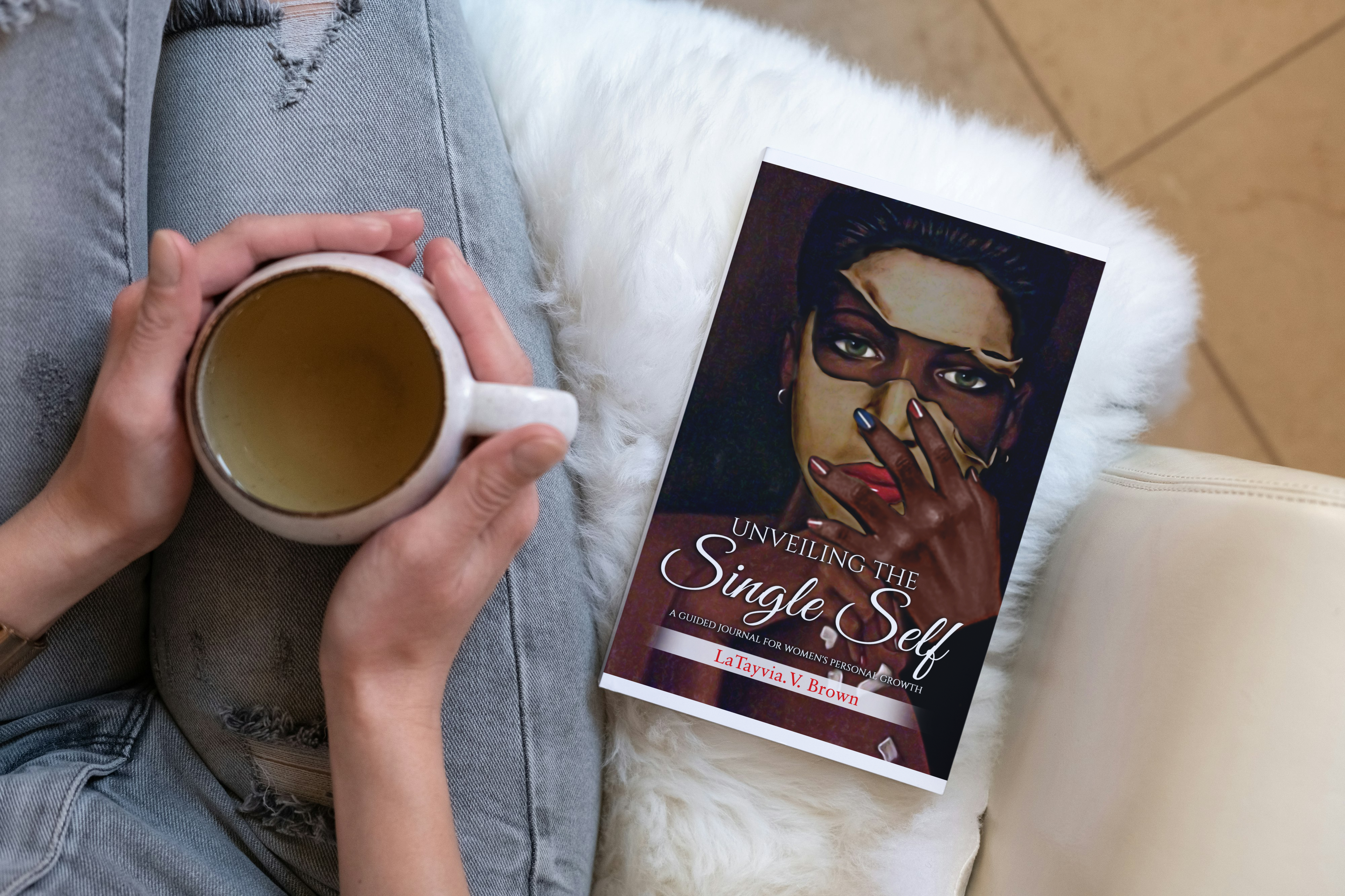Unveiling the Single Self book with coffee — lifestyle photo